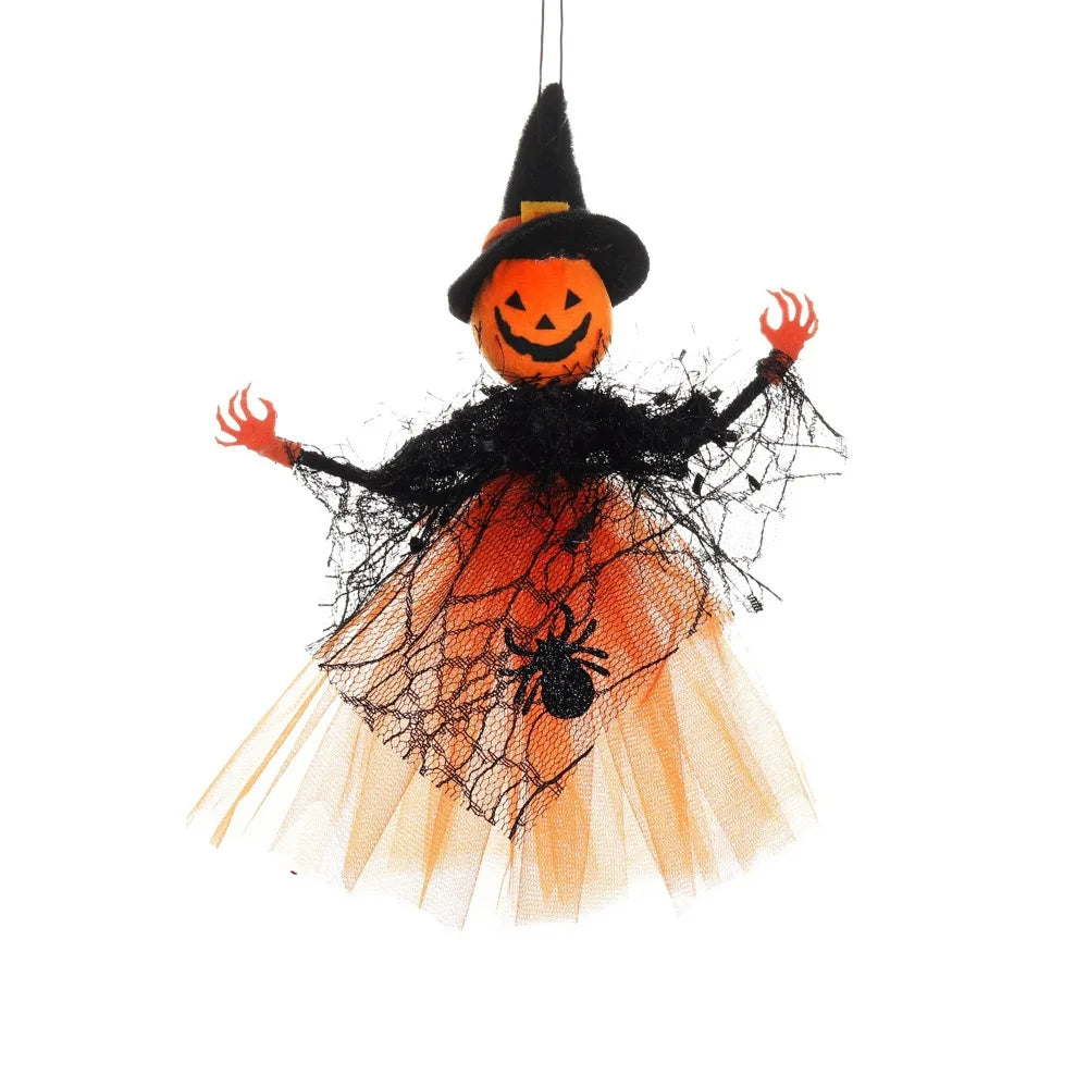 A Halloween ornament featuring a witch with an orange face, black hat, and a sheer orange dress.