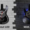 Comparison of a vintage vinyl record guitar wall clock without LED and with LED versions.