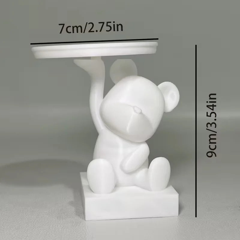 A white bear-shaped jewelry tray with a small platform and stand.