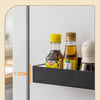 A close-up view of a magnetic suction rack designed for the refrigerator, holding glass spice bottles.