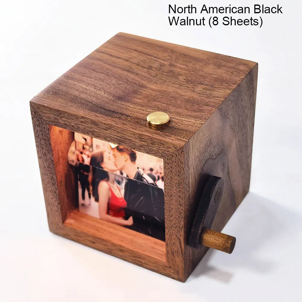 A wooden hand-crank flip photo frame with an LED light, featuring a photo of a couple.