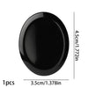 A black oval bead made of natural stone for jewelry and crafts.