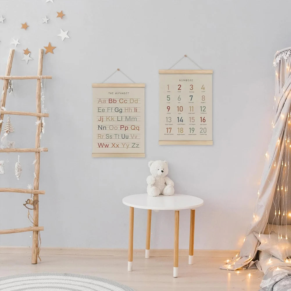 A wooden magnetic poster frame with letters and numbers is displayed on a white table against a light gray wall.