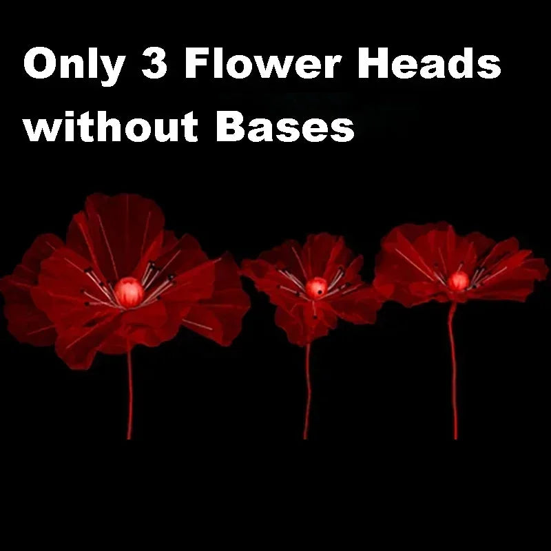 Three red velvet mesh flower heads without bases for wedding decoration.