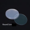 A round, translucent silicone disc measuring 5cm is shown against a dark background.