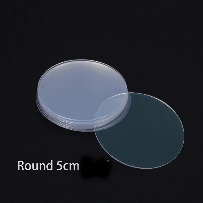 A round, translucent silicone disc measuring 5cm is shown against a dark background.