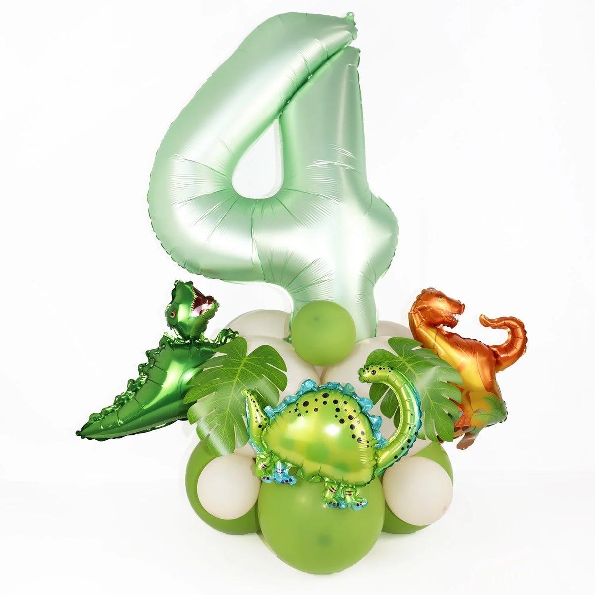 A set of foil balloons shaped like the number 4 and various dinosaur figures in avocado green and orange for a birthday decor