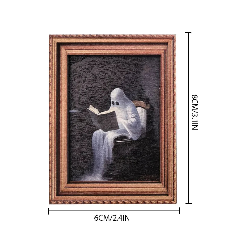 A framed painting featuring a white ghost figure against a dark background.