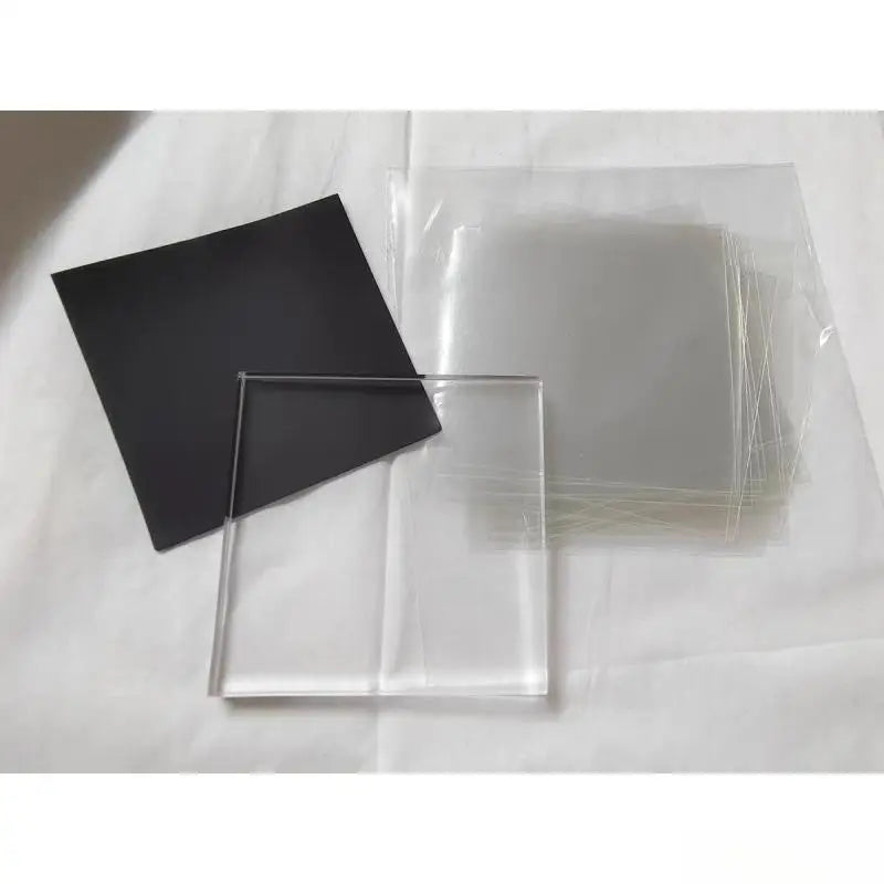 Black and clear acrylic magnetic sheets packaged together for crafts and refrigerator magnets