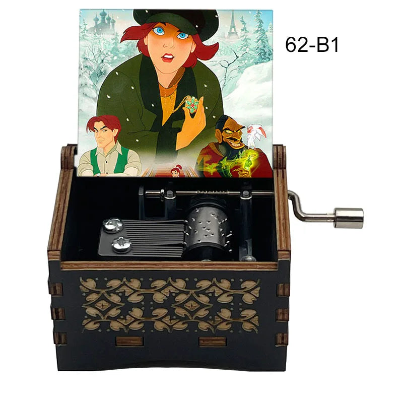 A hand-cranked wooden music box featuring an illustration of a character in green and orange, with other figures visible.