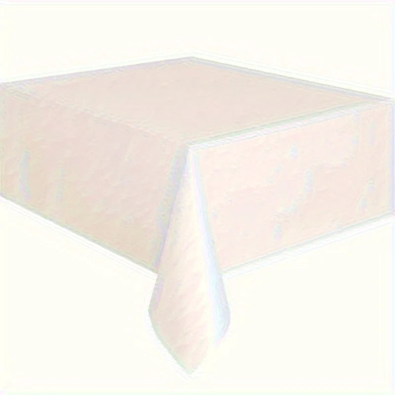 A white disposable tablecloth draped over a table.