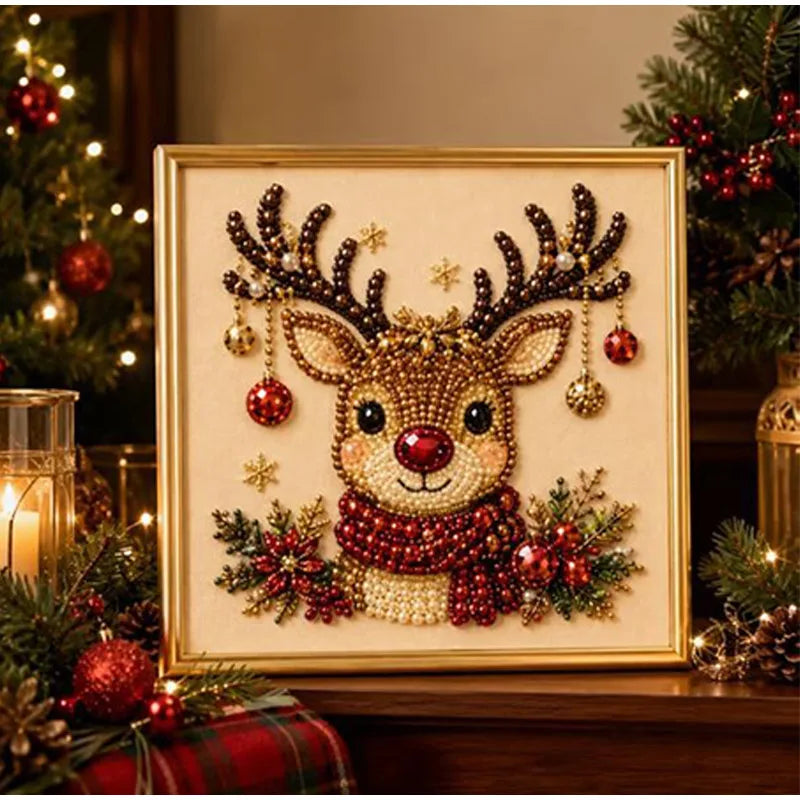 A framed piece of pearl and diamond painting depicting a deer head with antlers and festive greenery.