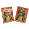 Two wooden photo frames featuring illustrations of frogs, one pink-headed and one brown.