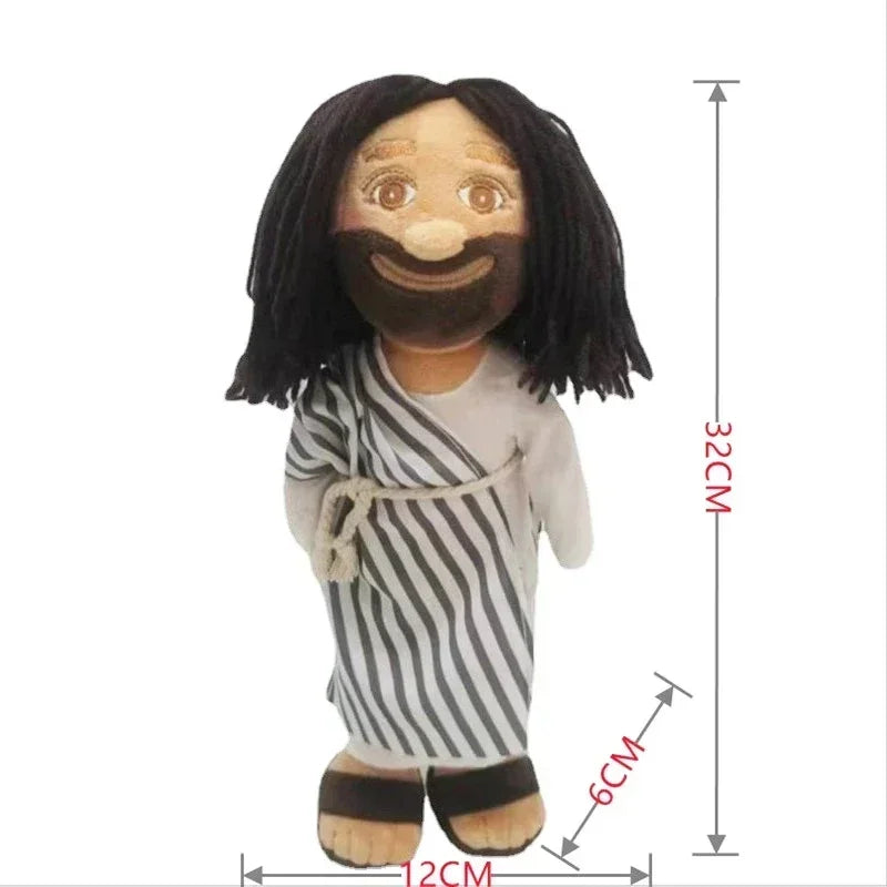 A plush doll depicting Jesus and the Virgin Mary with dark hair and striped clothing.
