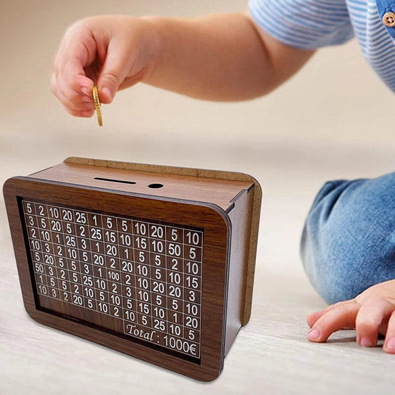 A child's hand is dropping a gold coin into a wooden piggy bank for saving goals.