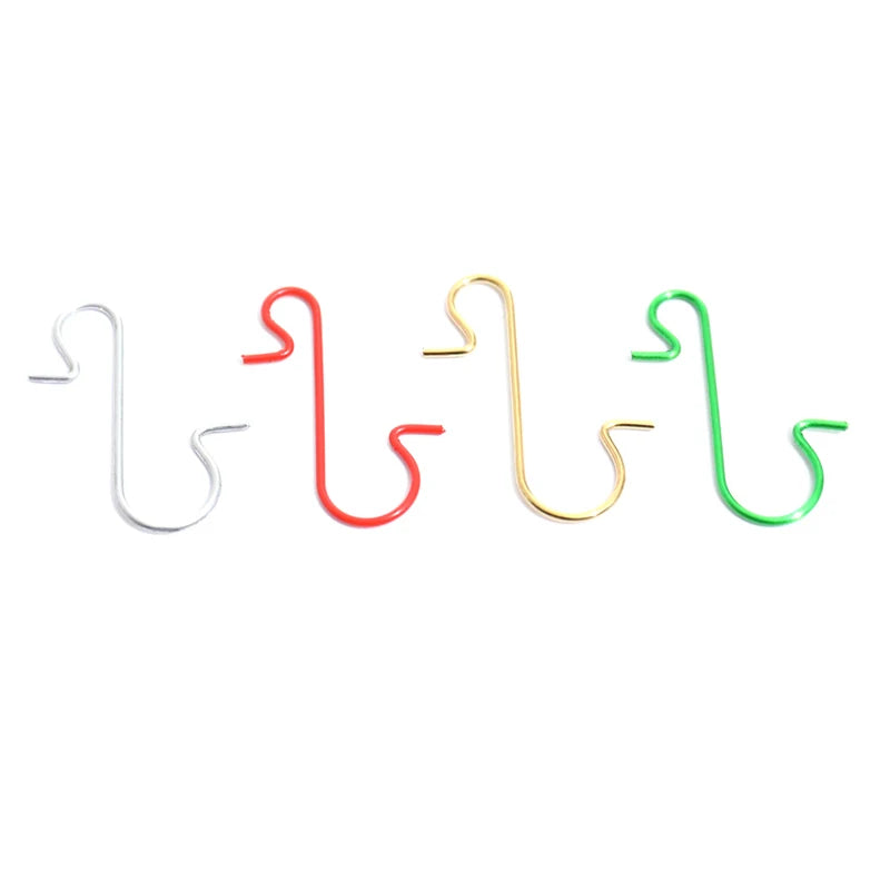 A set of decorative S-shaped hooks in silver, red, gold, and green.
