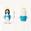 A white figurine of the Virgin Mary with black hair and a blue robe and yellow halo.