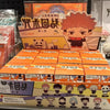 A display of Jujutsu Kaisen blind box collectible figures featuring various characters and a main figure.