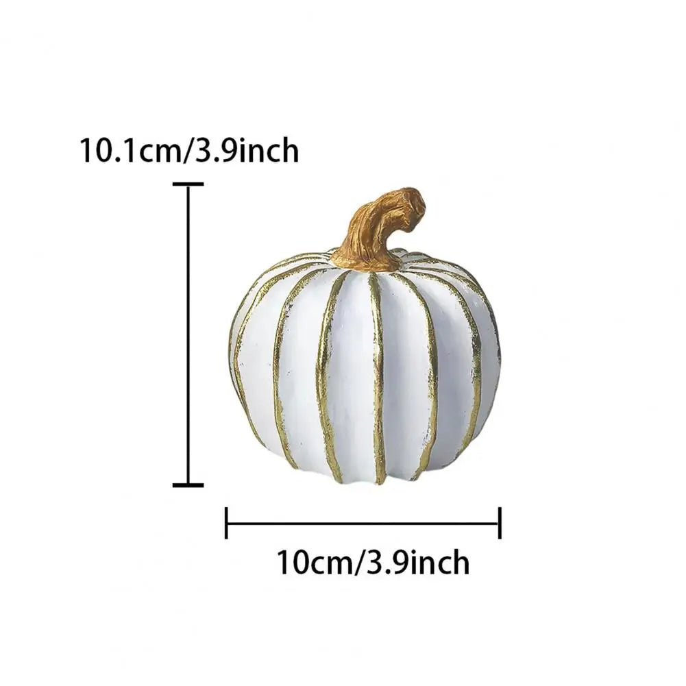 Elegant white and gold resin decorative pumpkin with a textured surface.