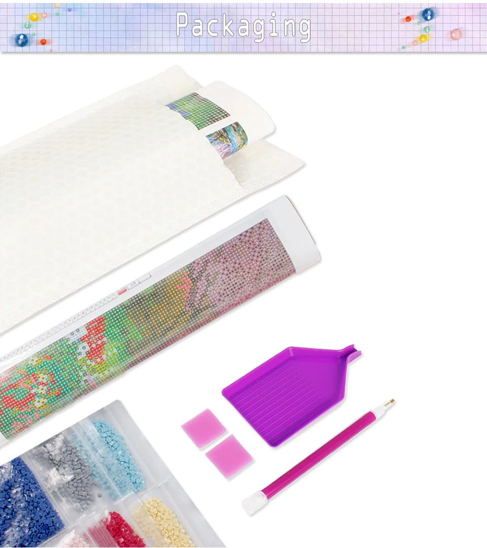 A diamond painting kit showing various colored beads and a pink brush on a white canvas.