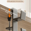 A close-up view of an adjustable desk bag hook mounted on a wooden surface, demonstrating its use for various desktop thickne