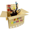A humorous 3D pop-up birthday card featuring a monkey character, heart balloons, and confetti.