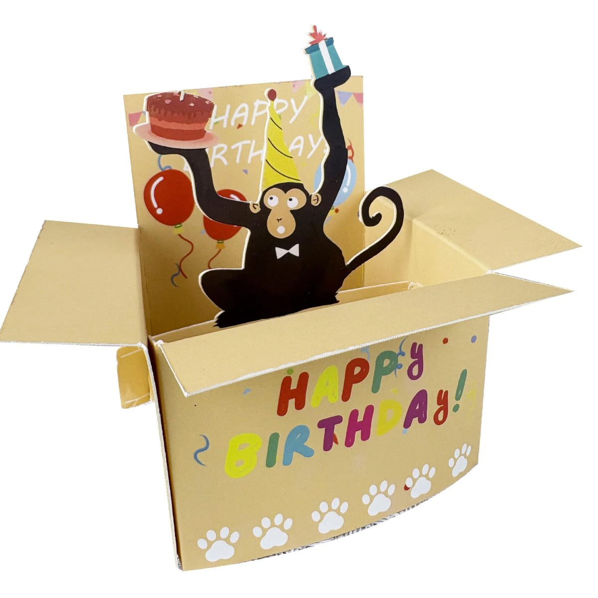 A humorous 3D pop-up birthday card featuring a monkey character, heart balloons, and confetti.
