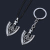 Silver arrow metal keychain featuring an anchor design on a black cord.