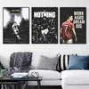 Three framed motivational canvas prints featuring football athletes like Ronaldo and a text saying All in Nothing