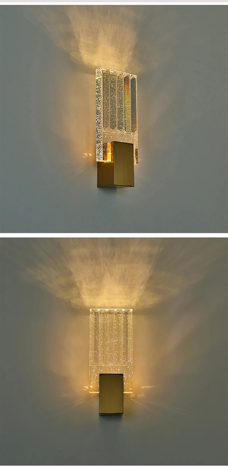 Modern bubble crystal LED wall sconces mounted on a white wall, casting a warm glow.