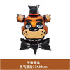 An orange and black foil balloon shaped like a bear's head for themed parties