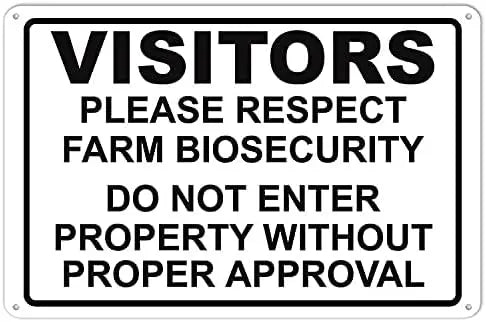 A black and white sign with text instructing visitors to respect farm biosecurity and not enter property without proper appro