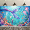 A vibrant underwater scene featuring a large purple mermaid tail and colorful coral and marine life.