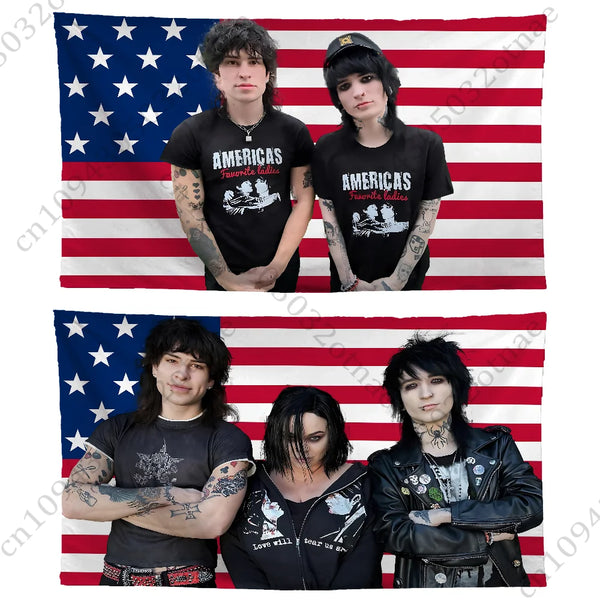 Three individuals posing in front of an American flag backdrop