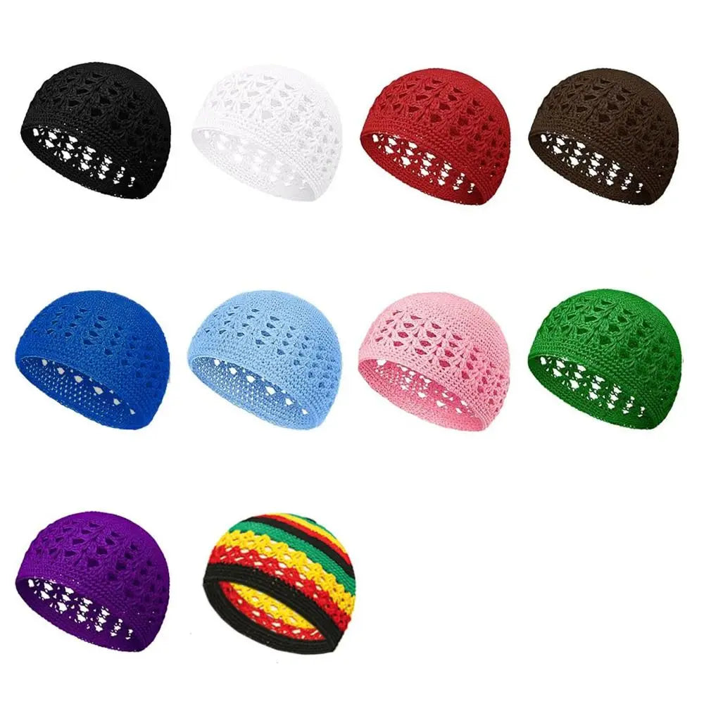A collection of nine handmade crochet beanie hats in various colors including black white red brown blue pink green and purpl