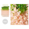 Pink silk wisteria vine garland with green leaves used for wedding and home decor