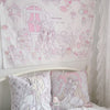 A white tapestry wall hanging featuring a kawaii cartoon illustration of a girl with long hair and pink accents for bedroom d