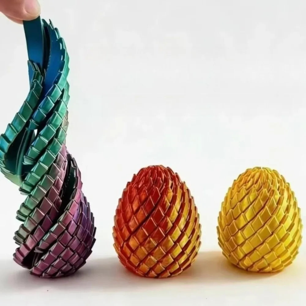 A close-up of a hand holding a stack of colorful, textured dragon egg fidget toys.