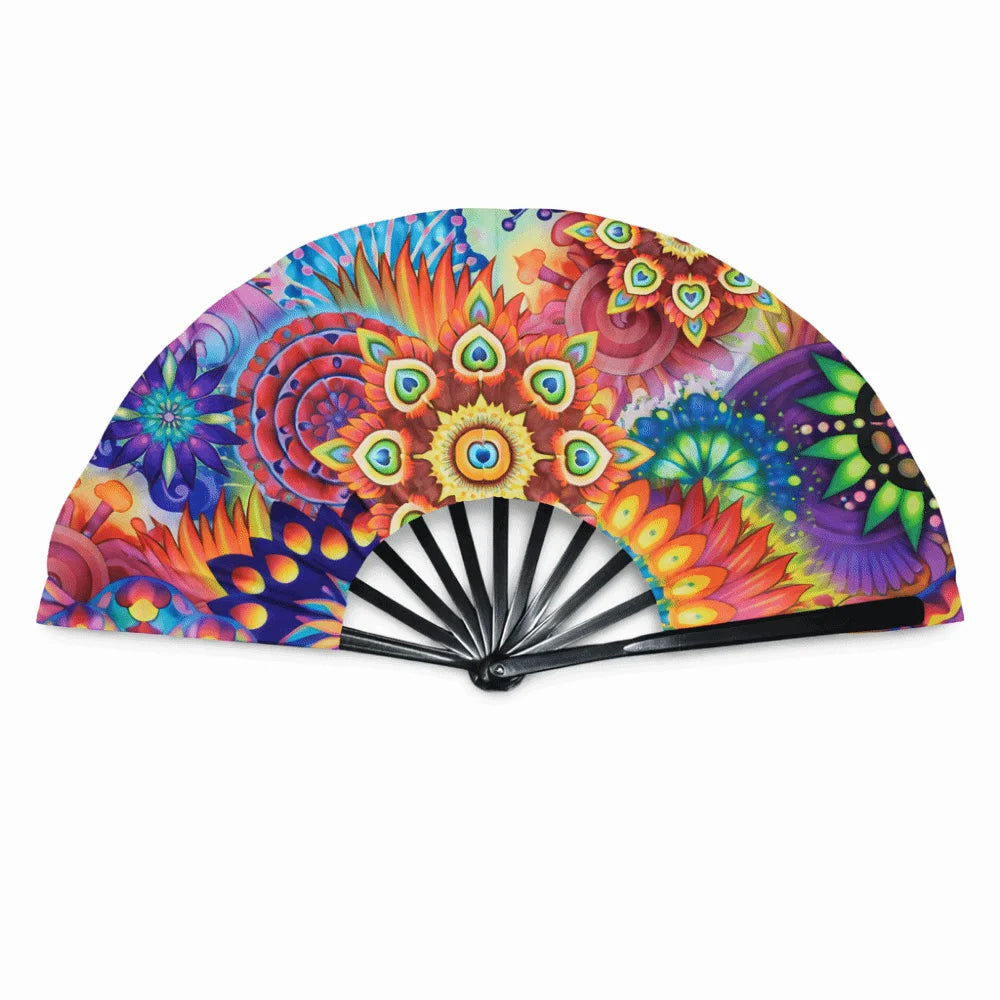 A folding rave hand fan with a vibrant, colorful, fluorescent UV glow pattern featuring floral and geometric designs.