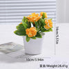 Artificial bonsai tree decoration with yellow flowers in a white pot
