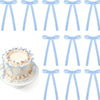 A set of blue and white gingham ribbon bow cake toppers in various styles.