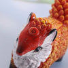 Hand-painted resin fox totem statue with orange and white coloring