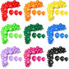 A collection of colorful latex balloons arranged in a curved garland pattern for party decoration.