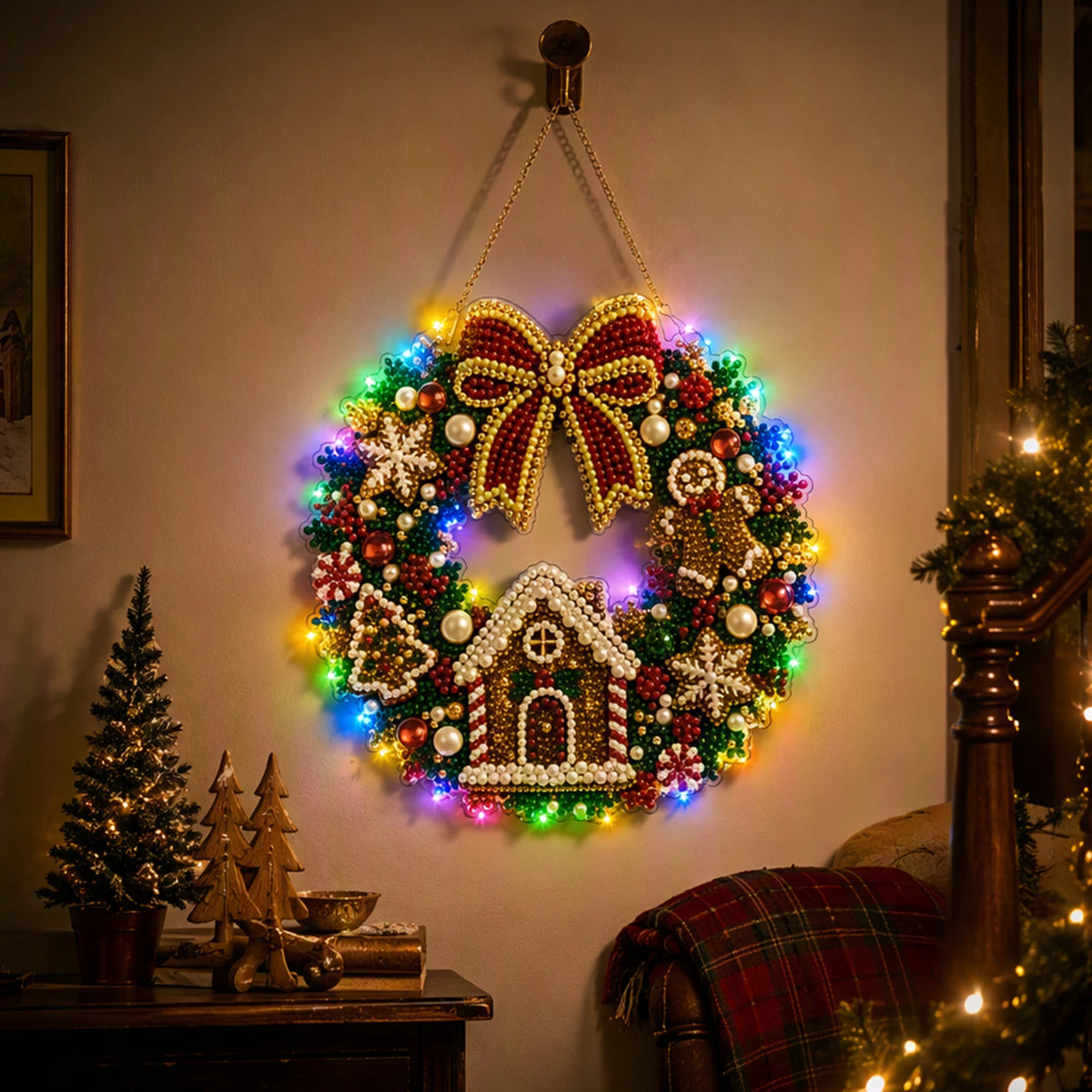 An LED-illuminated diamond painting wreath kit featuring a large, colorful Christmas wreath with a bow and ornaments.