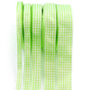 A roll of lime green gingham ribbon used for gift wrapping, crafts, and party decor.
