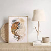 A framed canvas print depicting a tree of life merging with a Buddha silhouette in earthy tones against a white background.