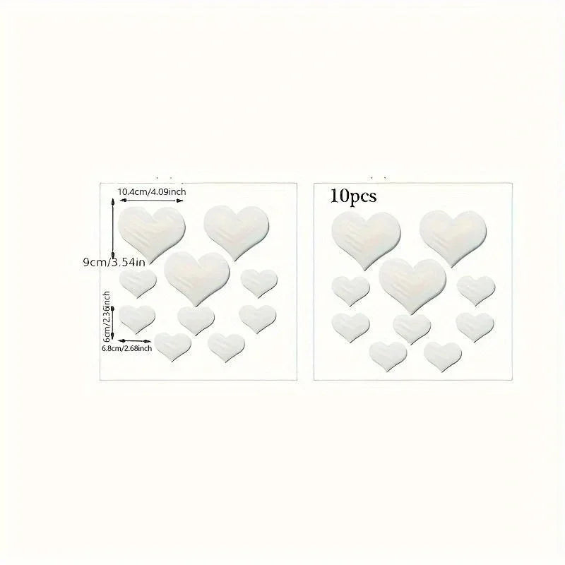 A set of 10 heart-shaped mirror wall stickers measuring 10.4cm in diameter.