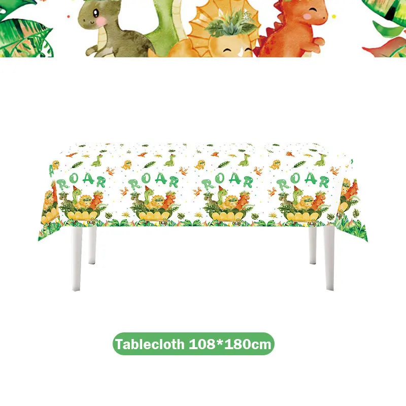 Green tablecloth featuring dinosaur and floral patterns for a birthday party