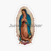 A sticker featuring a depiction of the Virgin Mary with a halo and rays of light.