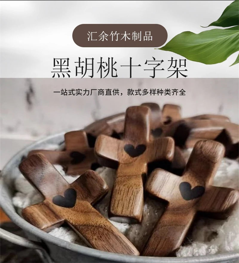A collection of dark wood wooden crosses with epoxy hearts displayed in a bowl.
